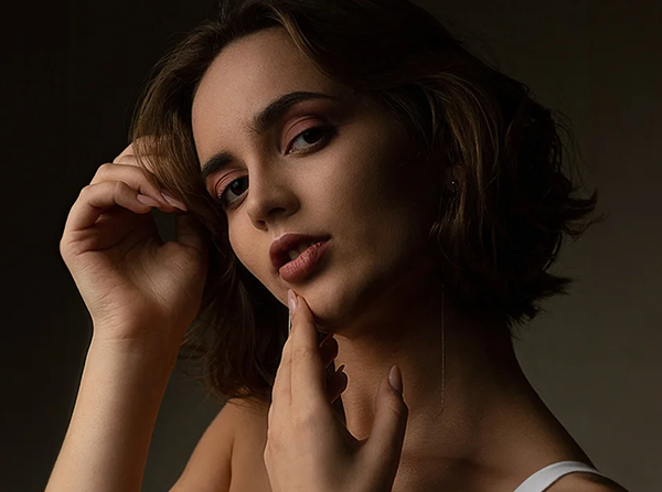 woman beautiful touching her chin